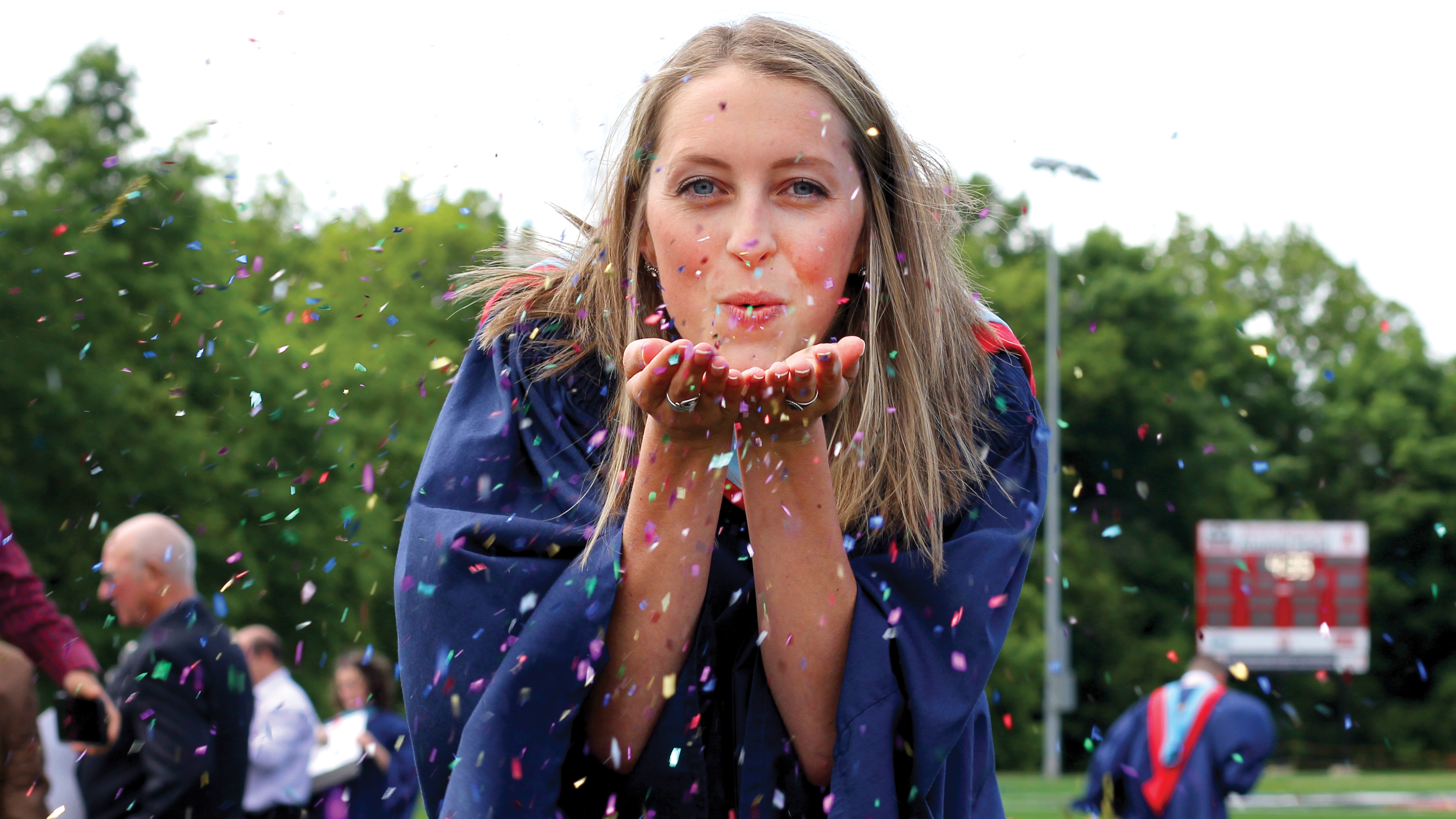 This image is of a Brock University graduate with confetti at convocation